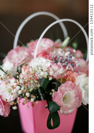 Pink Flower Arrangement in Decorative Basket 134413112