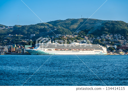 Cruise ship arriving at Nagasaki Port (Norwegian Spirit) from the opposite shore [Nagasaki City] 134414115
