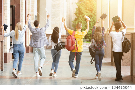 Pass exams. Students walking in college campus after the last test Pass exams. Students walking in college campus after the last test 134415044