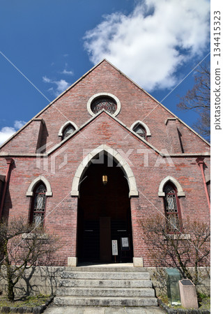 Doshisha Chapel shining against the blue sky 134415323
