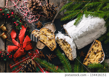 Stollen with filling of raisins, candied fruit 134416151
