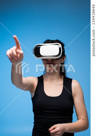 Architect Examining Virtual Design Elements Through VR Interface with Precise Hand Interaction 134416649