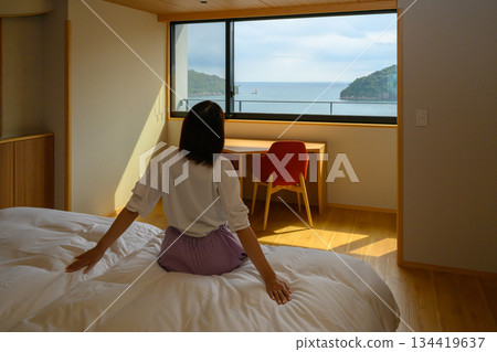 Wake up in a hotel with a view of the ocean from the window 134419637