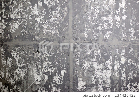 Detailed capture of a rough gray texture background with bold brush strokes and a superimposed cross Detailed capture of a rough gray texture background with bold brush strokes and a superimposed cross 134420422