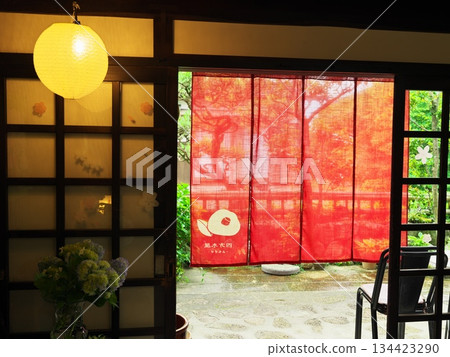 Magome-juku in June: A teahouse with a red noren curtain, view from inside Shimokiya 134423290