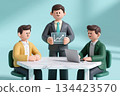 Three men in business attire at a meeting table. 134423570