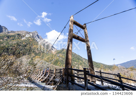Myojin bridge in front of the mount Yari in Kamikochi national park, Nagano prefecture, Japan Myojin bridge in front of the mount Yari in Kamikochi national park, Nagano prefecture, Japan 134423606