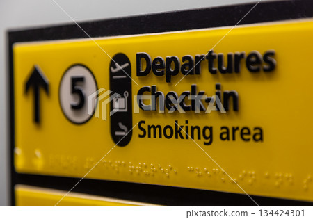Departures Check In Elevator or Lift Sign at an Airport Departures Check In Elevator or Lift Sign at an Airport 134424301