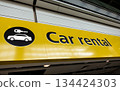 Hire Car Rental Sign at an Airport 134424303