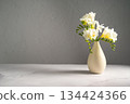 White floral spring, easter background. Freesia white flowers in vase, copy space 134424366