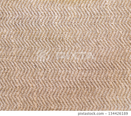 Natural woven jute fabric texture background in zigzag pattern 134426189