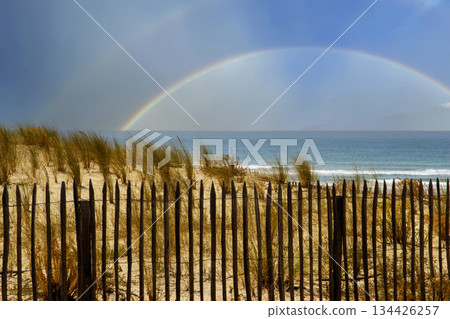 Rainbow Appears Over the Ocean at Soulac-sur-Mer in France 134426257
