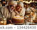 Joyful couple celebrating birthday with cake and festive decorations 134426430