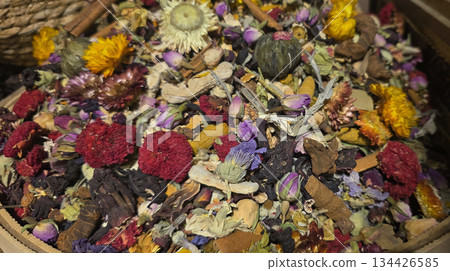 Colorful dried flower arrangement in woven basket showcasing natural beauty Colorful dried flower arrangement in woven basket showcasing natural beauty 134426585