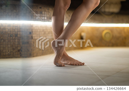 Close up picture of slim beautiful female legs and feet on tiptoes Close up picture of slim beautiful female legs and feet on tiptoes 134426664
