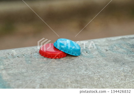 two soda caps closeup closeup 134426832