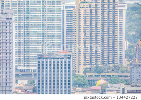 Urban skyline with modern buildings and greenery 134427222