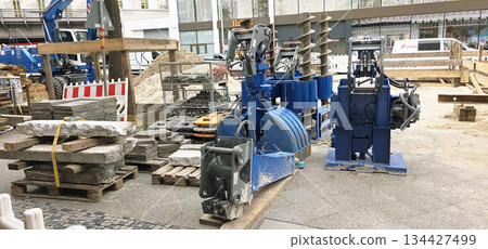 Berlin, Germany - September 22, 2025: Construction machinery and tools on site with copy space for design 134427499