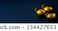 Chinese New Year decor with gold ingots on blue background 134427653