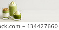 Matcha drink and dessert assortment on light background 134427660