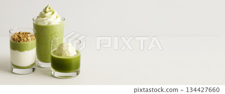 Matcha drink and dessert assortment on light background 134427660