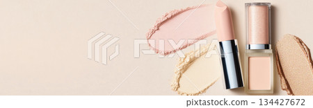 Fluid cosmetics textures featuring spread highlighter and foundation cream Fluid cosmetics textures featuring spread highlighter and foundation cream 134427672