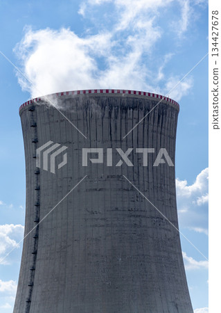 Cooling towers at nuclear power plant, energy self-sufficiency, greenhouse emission reduction and global warming concept Cooling towers at nuclear power plant, energy self-sufficiency, greenhouse emission reduction and global warming concept 134427678