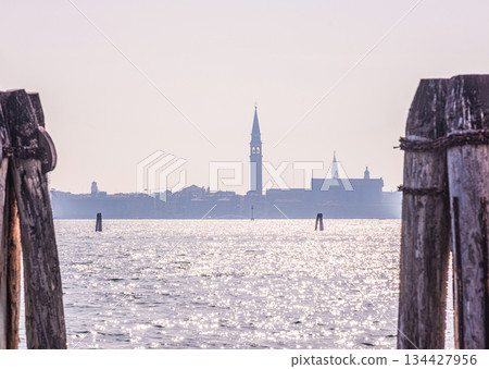 view Murano island in north lagoon and glassware factories on Venice. 134427956