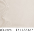 Smooth elegant golden silk or satin luxury cloth texture as wedding background. Luxurious background design. In Sepia toned. Retro style 134428387