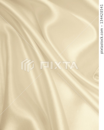 Smooth elegant golden silk or satin luxury cloth texture as wedding background. Luxurious background design. In Sepia toned. Retro style Smooth elegant golden silk or satin luxury cloth texture as wedding background. Luxurious background design. In Sepia toned. Retro style 134428541
