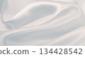 Smooth elegant grey silk or satin luxury cloth as wedding background. Luxurious background design 134428542