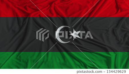 Libya flag with fabric texture background. National flag of Libya with cloth texture 134429629