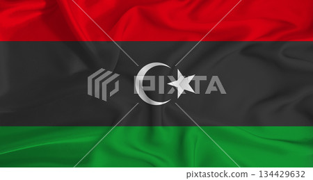 Realistic Libya flag waving. Close up of flag of Libya with cloth texture Realistic Libya flag waving. Close up of flag of Libya with cloth texture 134429632