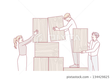 Businesspeople build wooden tower involved in teamwork 134429825