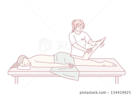 Happy client relax on table in massage saloon 134429925