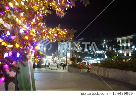 Christmas lights background  (Christmas tree) - blur - night view - traces of headlights and taillights of cars of Rustaveli Avenue in Tbilisi 134429999