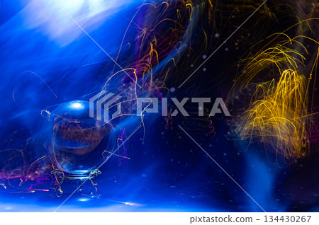 Abstract Cosmic Energy and Crystal Ball with Neon Light Trails Abstract Cosmic Energy and Crystal Ball with Neon Light Trails 134430267
