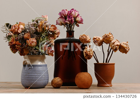 A quiet still life featuring dried floral arrangements A quiet still life featuring dried floral arrangements 134430726
