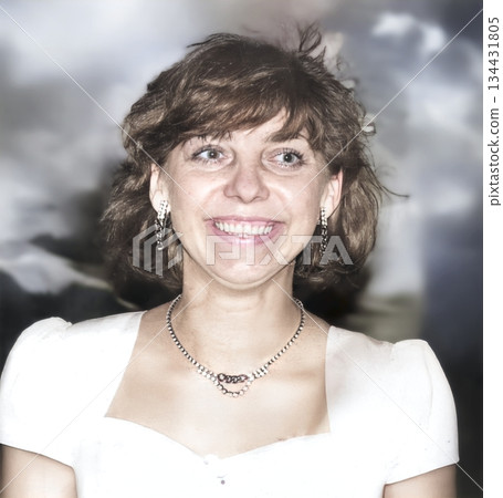 A vintage portrait of a happy bride at a post-wedding party. Retro photo from 1993. 134431805