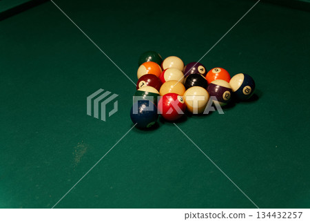 Vivid Pool Balls On Green Felt, Brightly Colored Pool Balls On Textured Felt Surface With Shadows 134432257