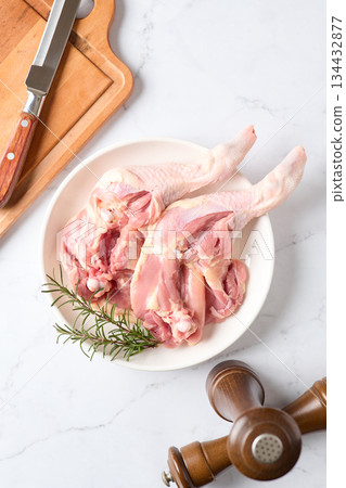 Bone-in chicken thighs Bone-in chicken thighs 134432877