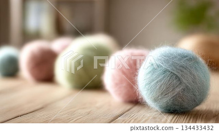 柔和色調的粉紅彩色毛線的特寫。 134433432