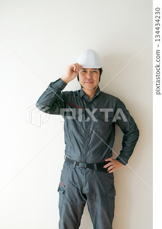 A man wearing a helmet 134434230
