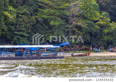Longtail boat long tail boats at jungle Patong Beach Thailand. 134434338