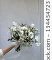A refreshing natural bouquet of white, green and light blue. 134434723