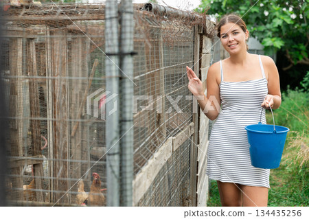 young girl at farm 134435256
