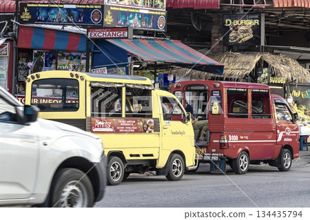 Red yellow public transportation tuk tuk car taxi Phuket Thailand. Red yellow public transportation tuk tuk car taxi Phuket Thailand. 134435794