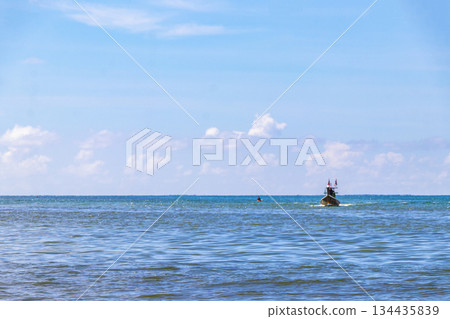 Longtail boat long tail boats at the Patong Beach Thailand. 134435839