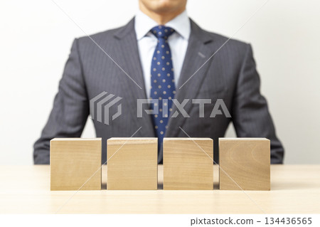 Businessman and blank blocks Businessman and blank blocks 134436565
