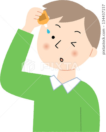 A man pointing to eye drops 134437157